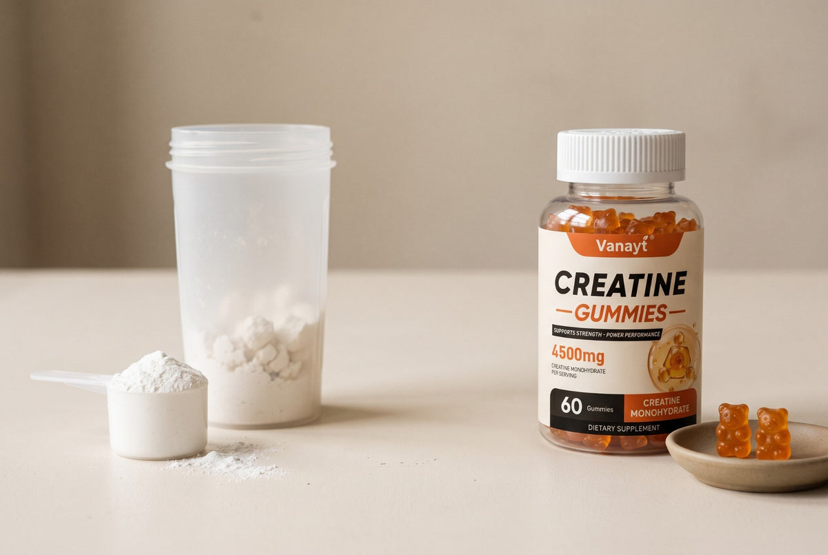 A scoop of creatine powder and a shaker next to a bottle of creatine gummies